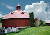 Final shot of large round barn roof repair.  You can see the amazing results of a full metal barn roof