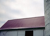 Another fine example of a refinished barn roof with our high quality metal roofing